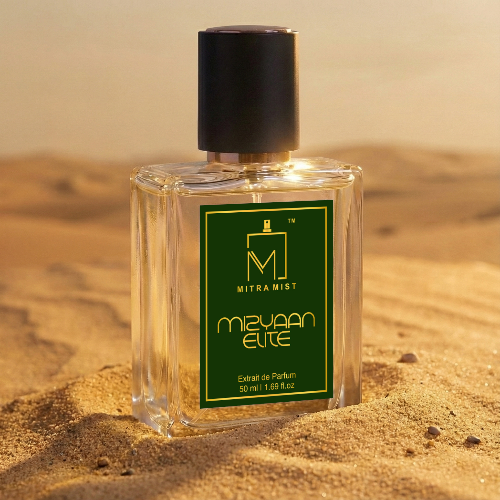 Perfume bottle with green label on sand